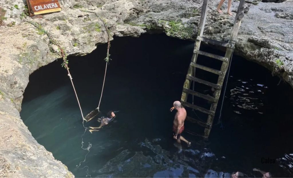 Aerial view of Cenote Calavera, one of the most famous cenotes in Tulum


