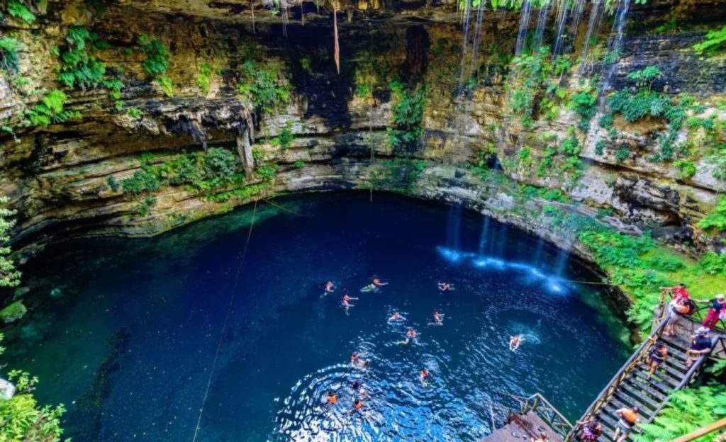 Dos Ojos, one of the most popular cenotes in Tulum. It features a circular pool where visitors can swim freely.