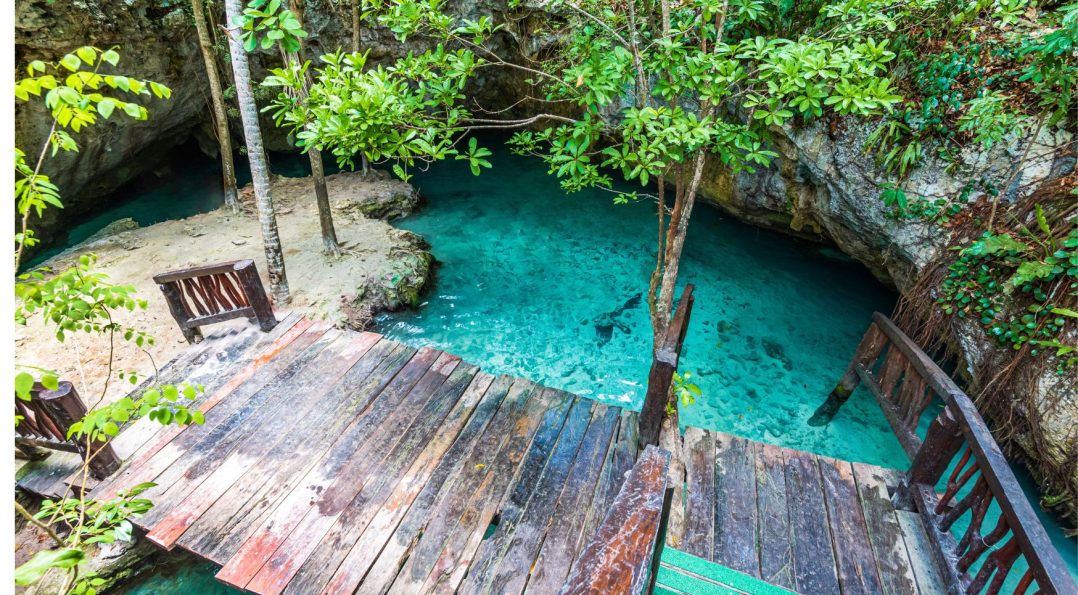 Paradisiacal cenote with crystal-clear water and no people