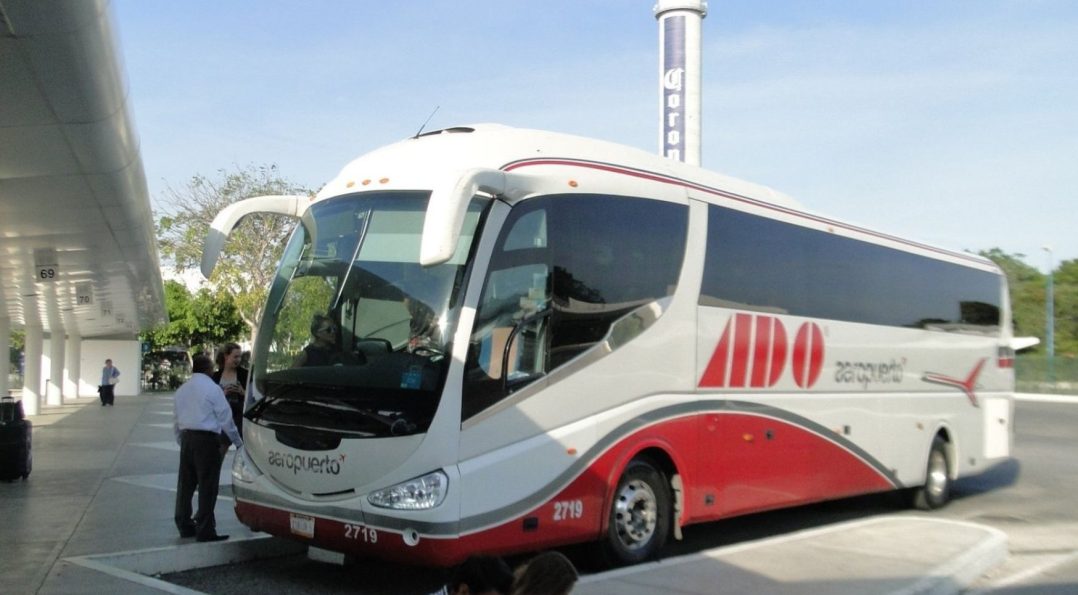 ADO bus traveling to Tulum — one of the most popular answers to how do you get to Tulum from Cancún or other cities in Mexico.